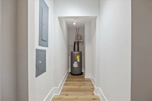 a front view of a house with a big yard