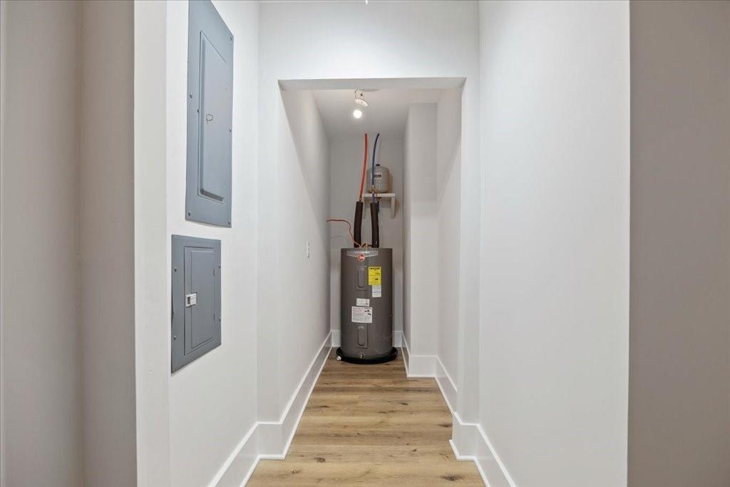 2400 Nebo Road Douglasville, GA 30134 - Photo 40 of 62 a view of a hallway with wooden floor and staircase