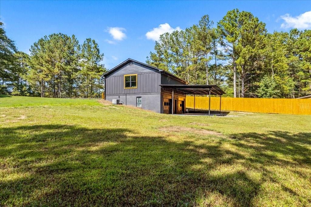 2400 Nebo Road Douglasville, GA 30134 - Photo 55 of 62 a view of a house with a yard