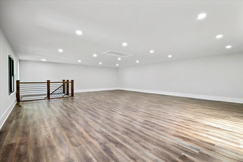 2400 Nebo Road Douglasville, GA 30134 - Photo 57 of 62 a view of empty room with wooden floor and fan