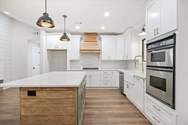a view of a small space with wooden floor