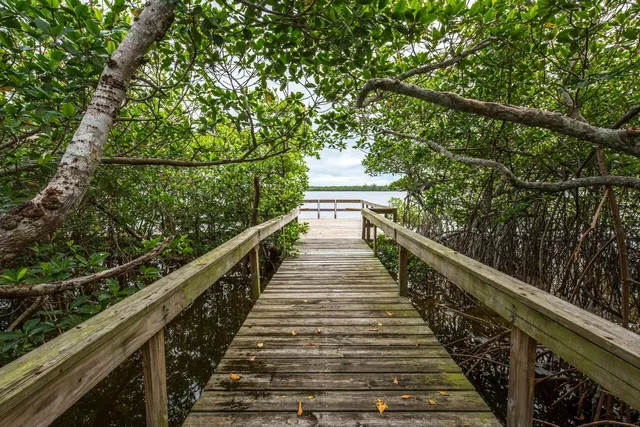 a view of balcony and yard