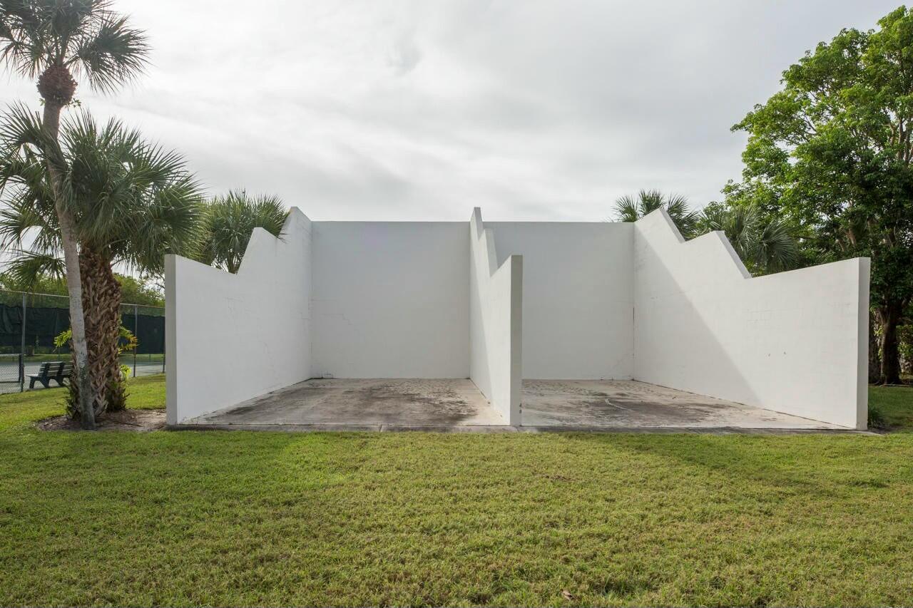 6166 Southeast Riverboat Drive, Unit 926 Stuart, FL 34997 - Photo 26 of 30 a view of a backyard