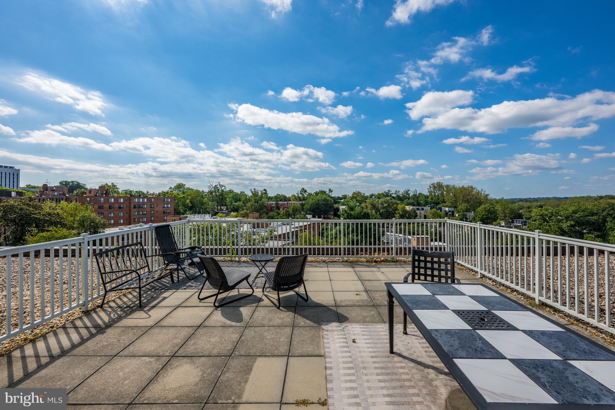 3901 Tunlaw Road Northwest, Unit 606 Washington, DC 20007 - Photo 25 of 37 Common Rooftop Deck with Views