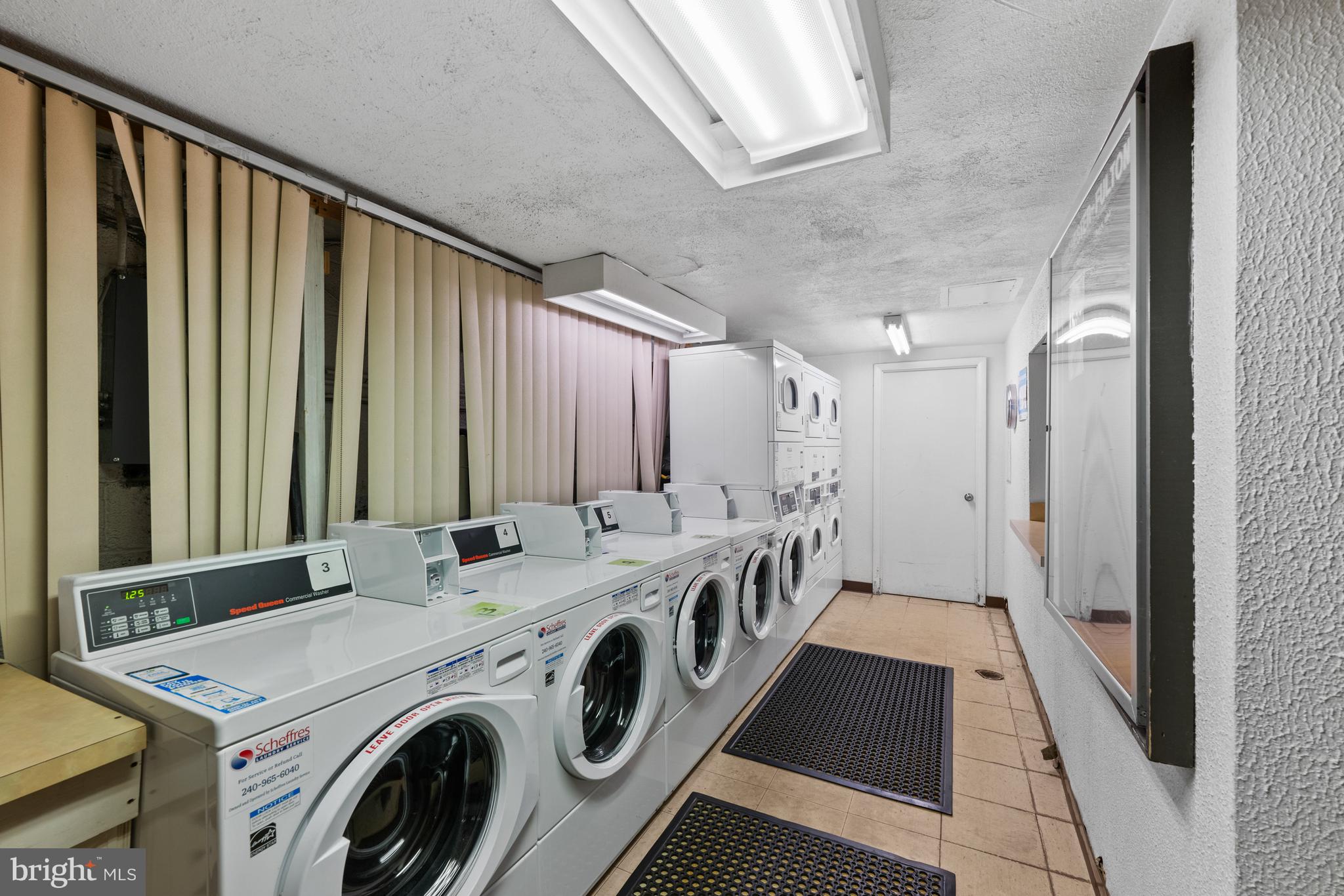 3901 Tunlaw Road Northwest, Unit 606 Washington, DC 20007 - Photo 27 of 37 Building Laundry Room