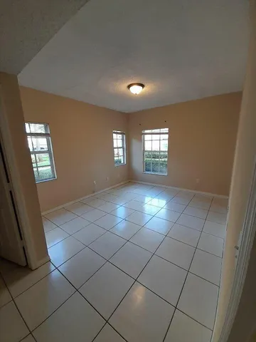 $1,850 | 10336 Fox Trail Road South, Unit 1306, Royal Palm Beach, FL 33411