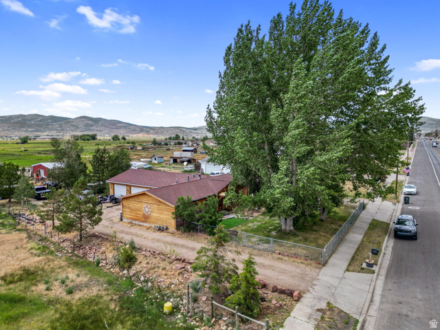 490 South Main Street Kamas, UT 84036 - Photo 23 of 25 Single-story property with a brown roof and light wood-tone siding