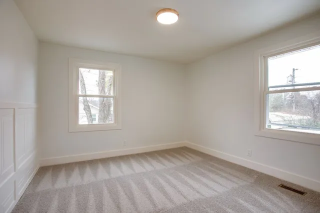 an empty room with a window