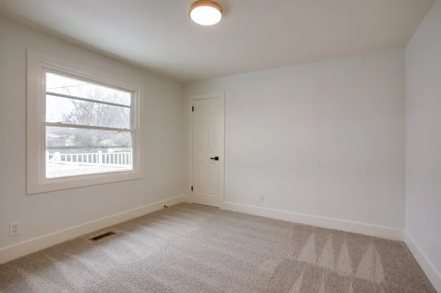 an empty room with a window