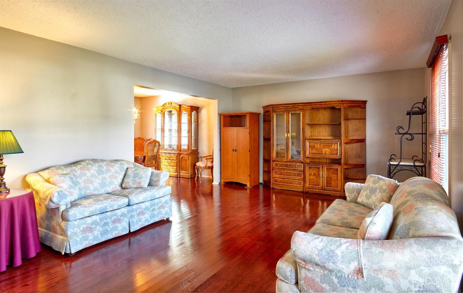 21 Aqueduct Place Howell, NJ 07731 - Photo 18 of 44 a living room with furniture and wooden floor