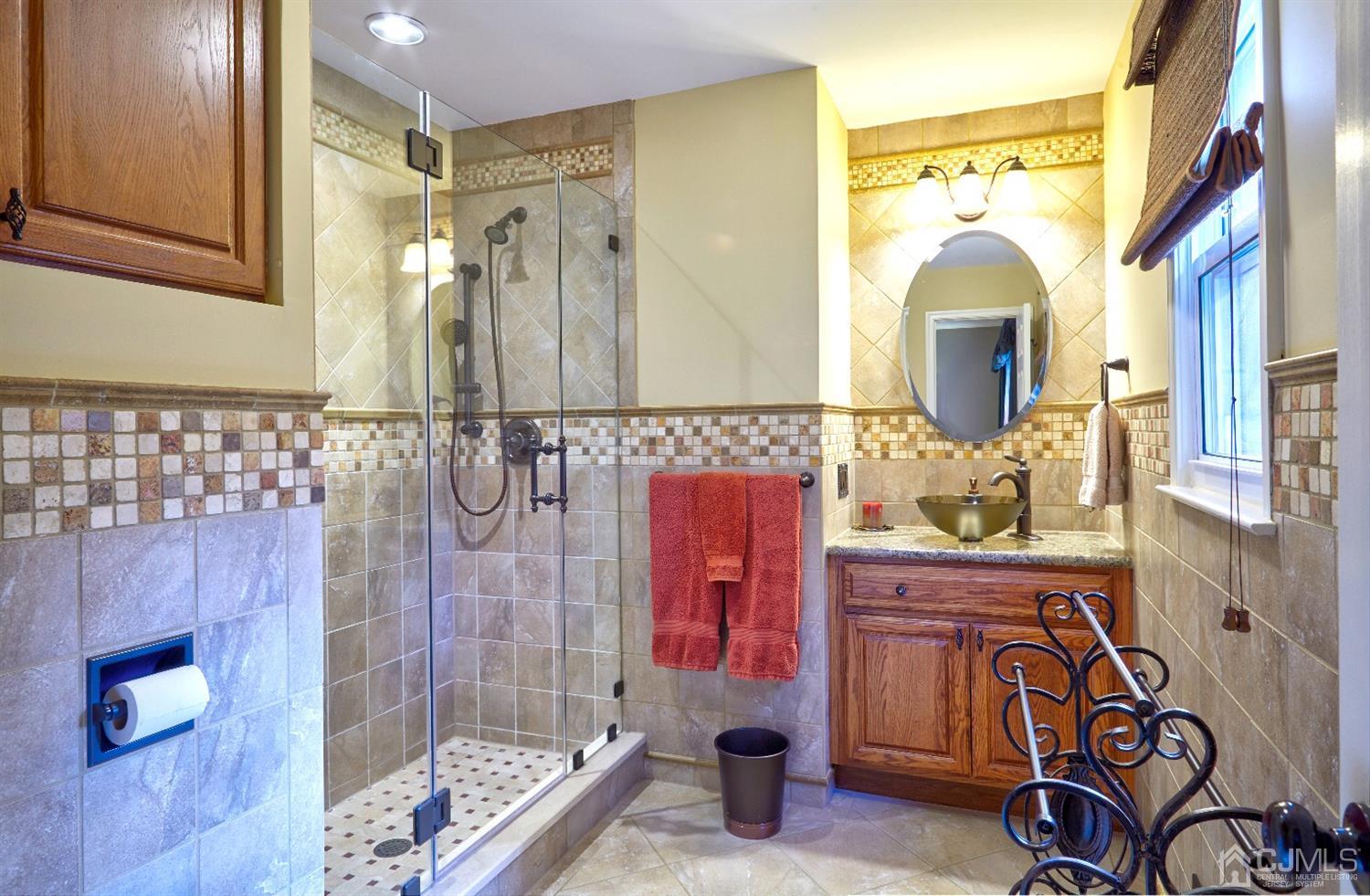 21 Aqueduct Place Howell, NJ 07731 - Photo 19 of 44 a bathroom with a bathtub and shower