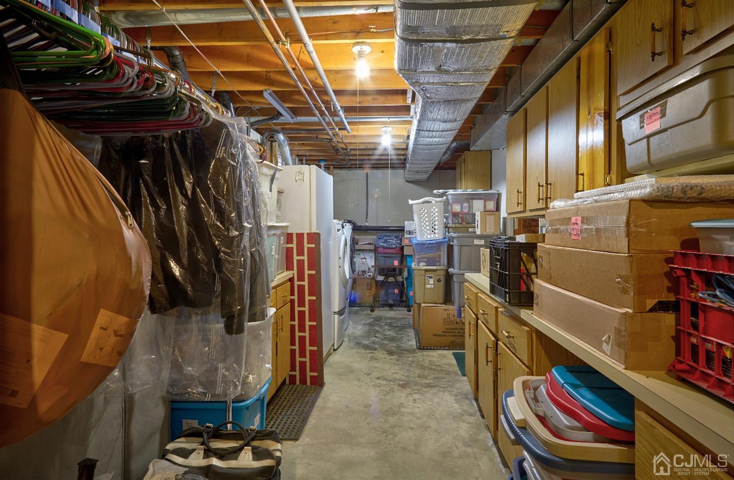 21 Aqueduct Place Howell, NJ 07731 - Photo 23 of 44 a view of storage and utility room