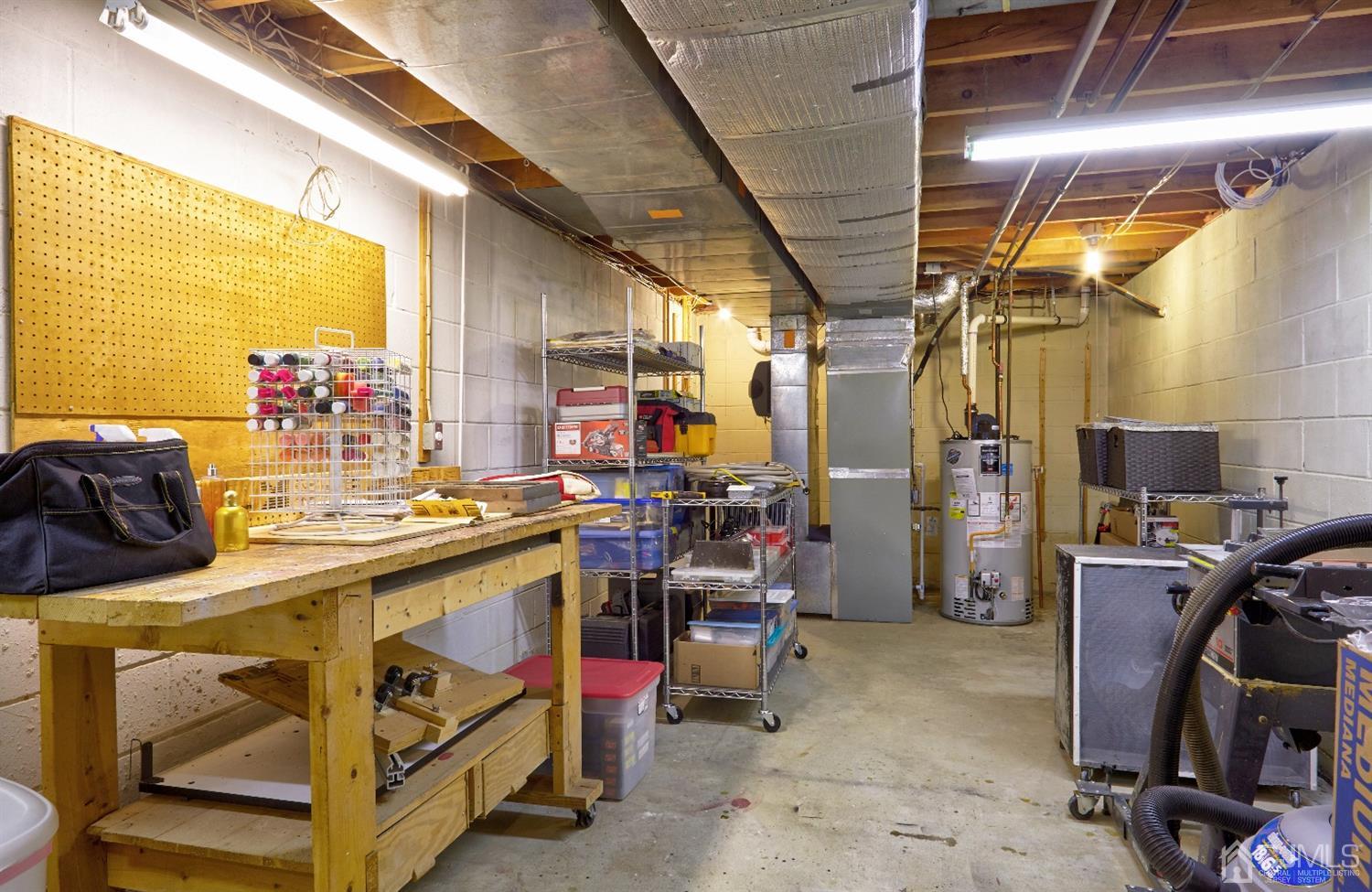 21 Aqueduct Place Howell, NJ 07731 - Photo 25 of 44 a view of utility room with stuff
