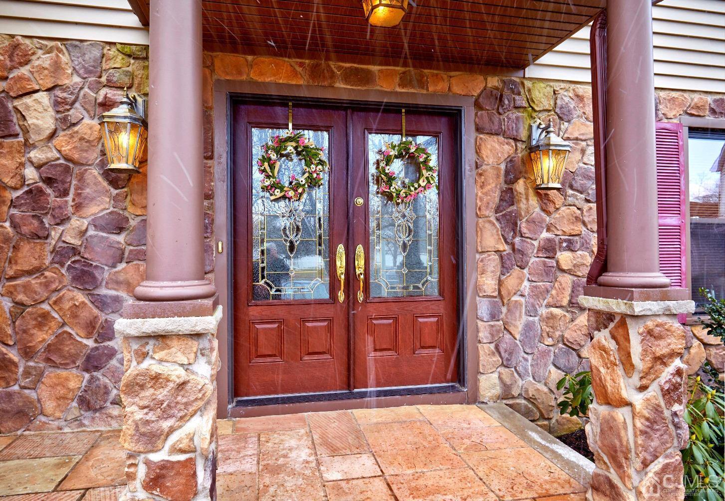 21 Aqueduct Place Howell, NJ 07731 - Photo 3 of 44 a view of a entryway door front of house