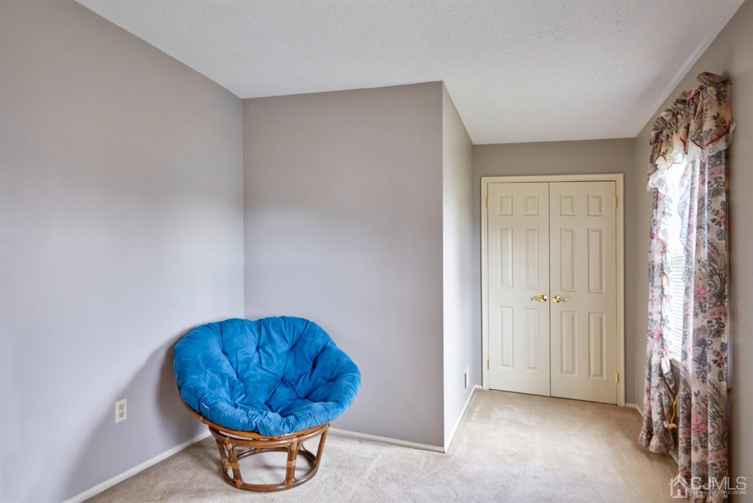 21 Aqueduct Place Howell, NJ 07731 - Photo 33 of 44 a view of a room with a potted plant and a window
