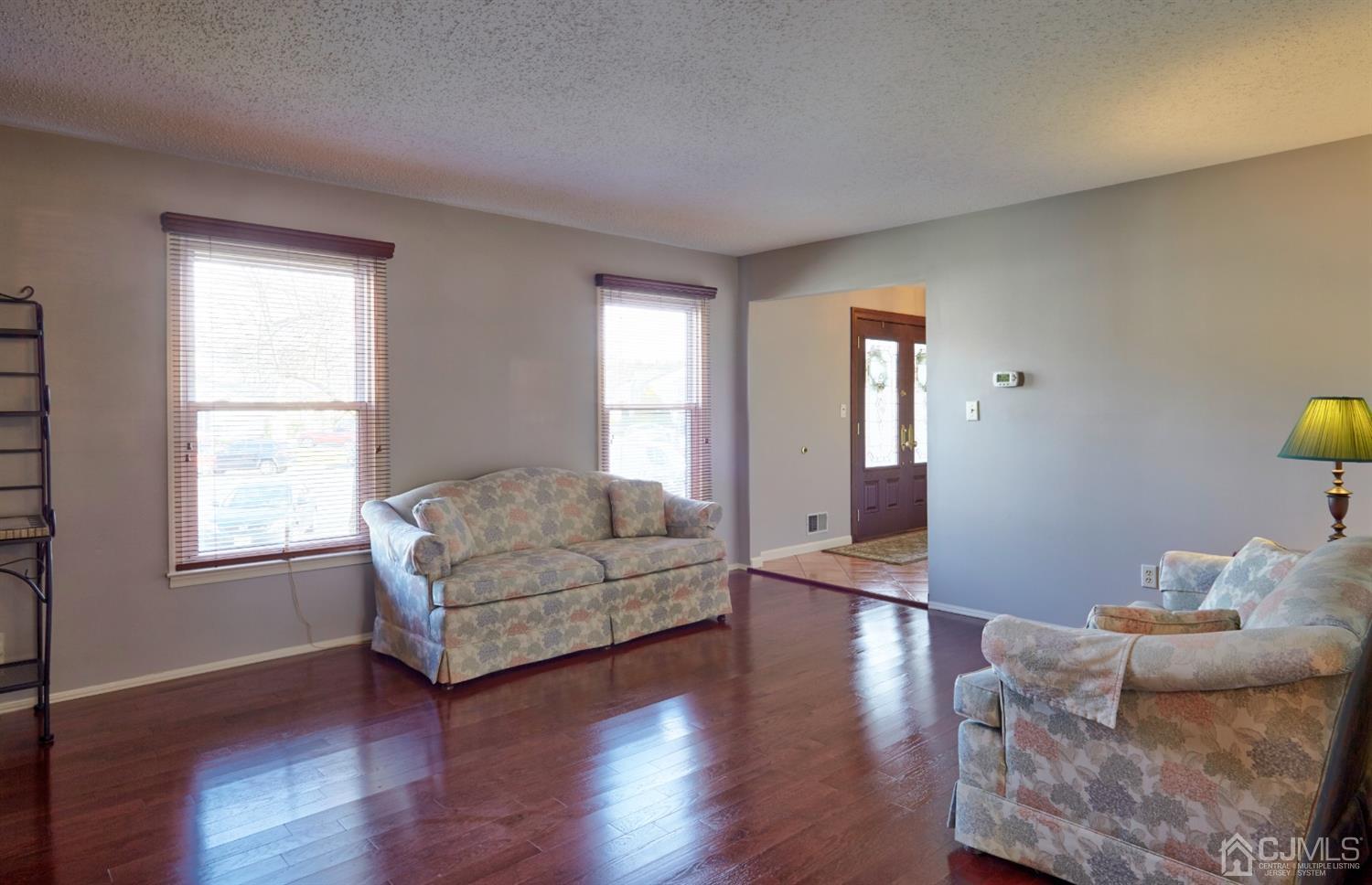 21 Aqueduct Place Howell, NJ 07731 - Photo 38 of 44 a living room with furniture and a window