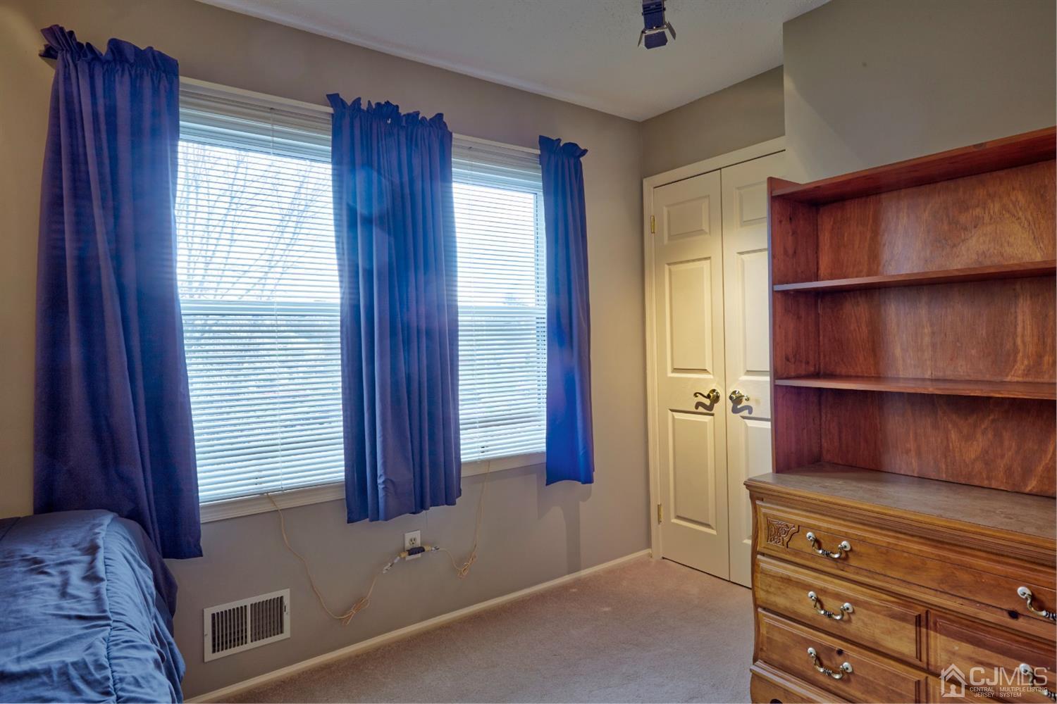 21 Aqueduct Place Howell, NJ 07731 - Photo 40 of 44 a view of walk in closet and furniture