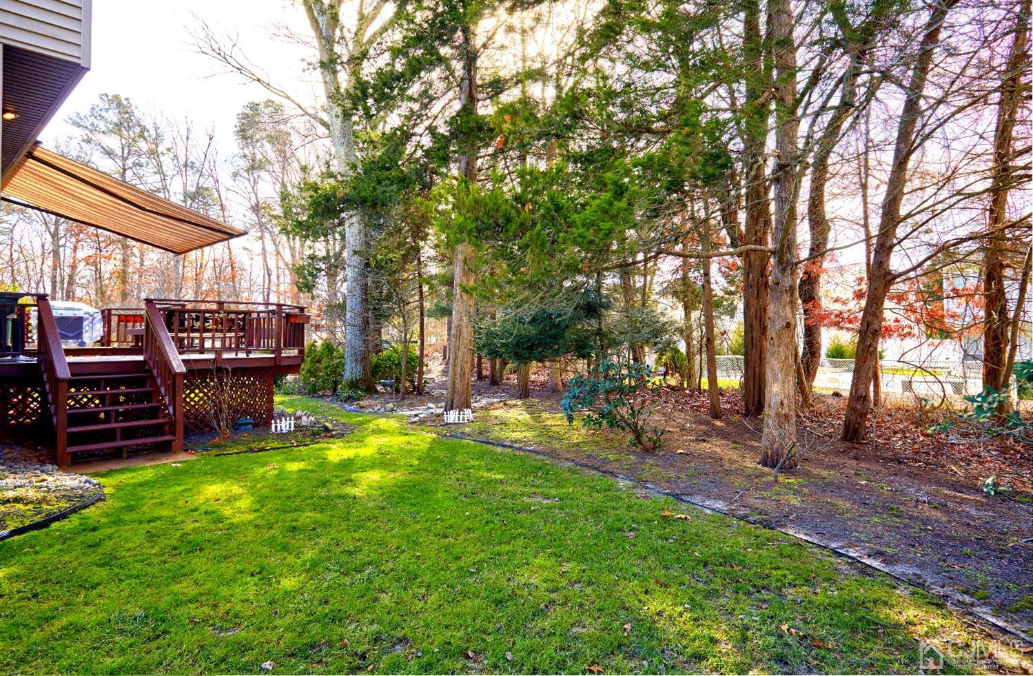 21 Aqueduct Place Howell, NJ 07731 - Photo 44 of 44 a view of a backyard with sitting area