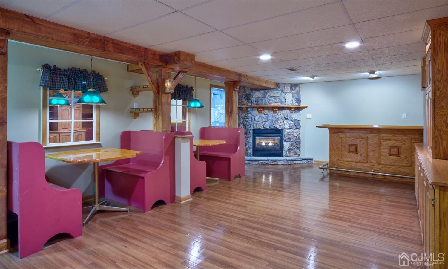21 Aqueduct Place Howell, NJ 07731 - Photo 8 of 44 a living room with furniture and a fireplace
