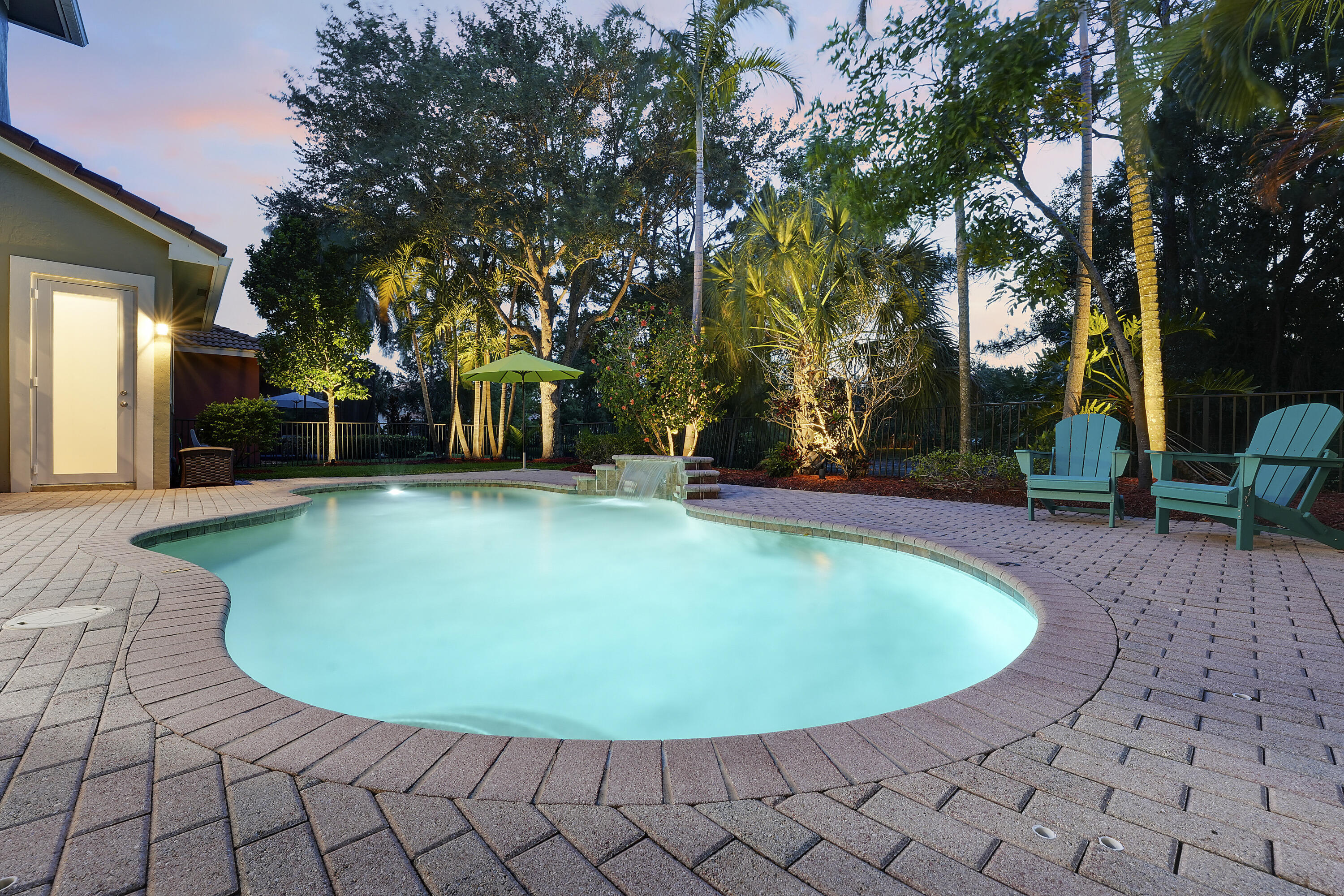 127 Via Castilla Jupiter, FL 33458 - Photo 56 of 80 a view of a swimming pool with an outdoor space