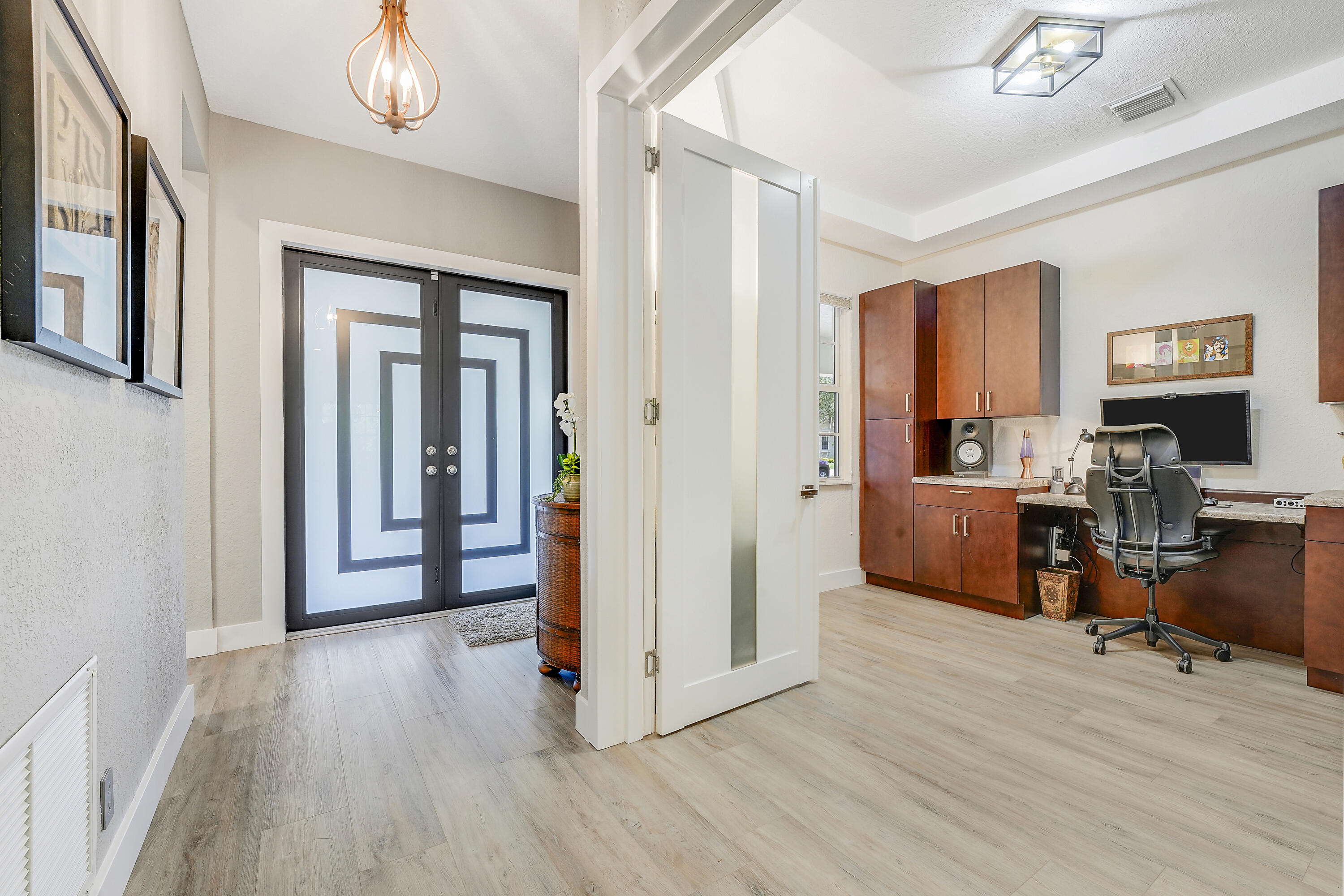 127 Via Castilla Jupiter, FL 33458 - Photo 9 of 80 a view of a livingroom with hardwood and furniture