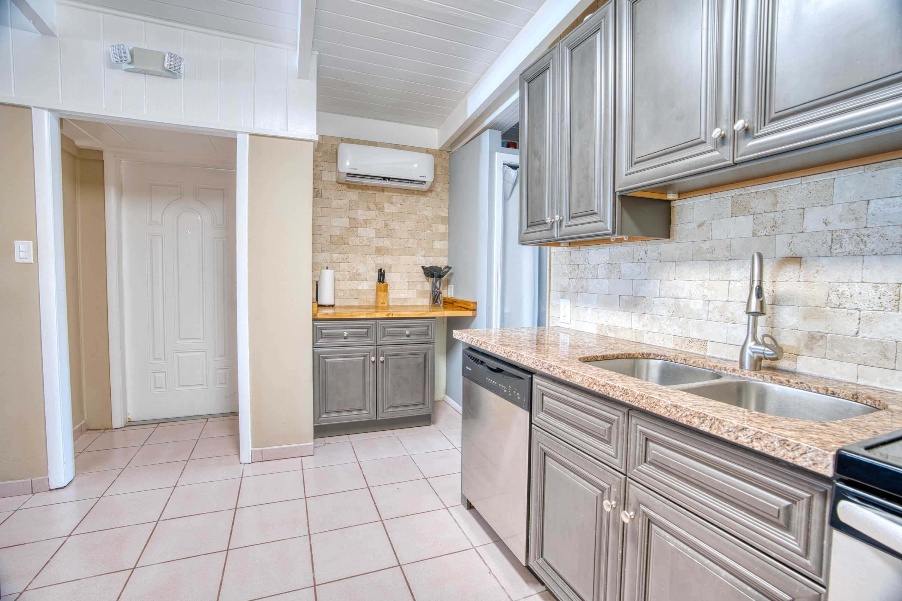 5 Sadowski Key Key Colony Beach, FL 33051 - Photo 18 of 26 a kitchen with a sink and cabinets