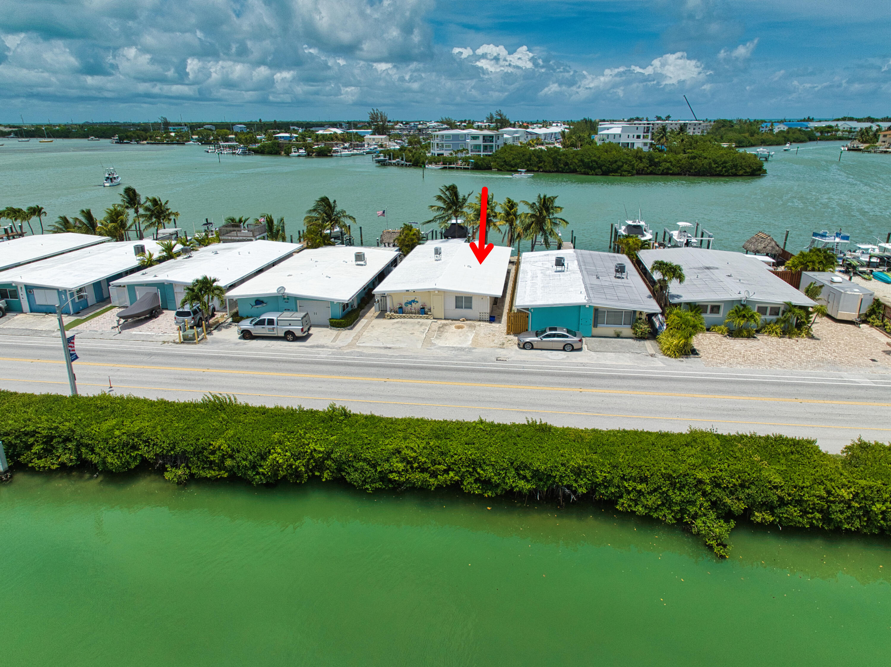 5 Sadowski Key Key Colony Beach, FL 33051 - Photo 10 of 26 an outdoor space with furniture and ocean view