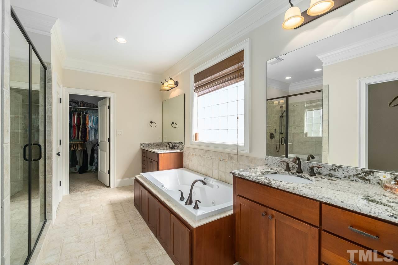 2310 Finley Ridge Lane Raleigh, NC 27615 - Photo 17 of 29 Master bath with spa tub.