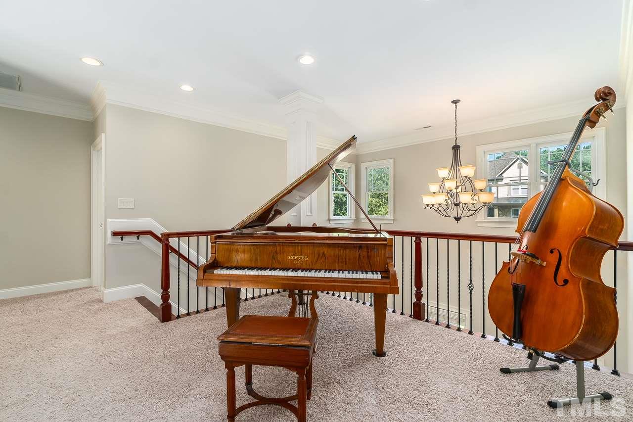 2310 Finley Ridge Lane Raleigh, NC 27615 - Photo 19 of 29 This loft is perfect for your piano!