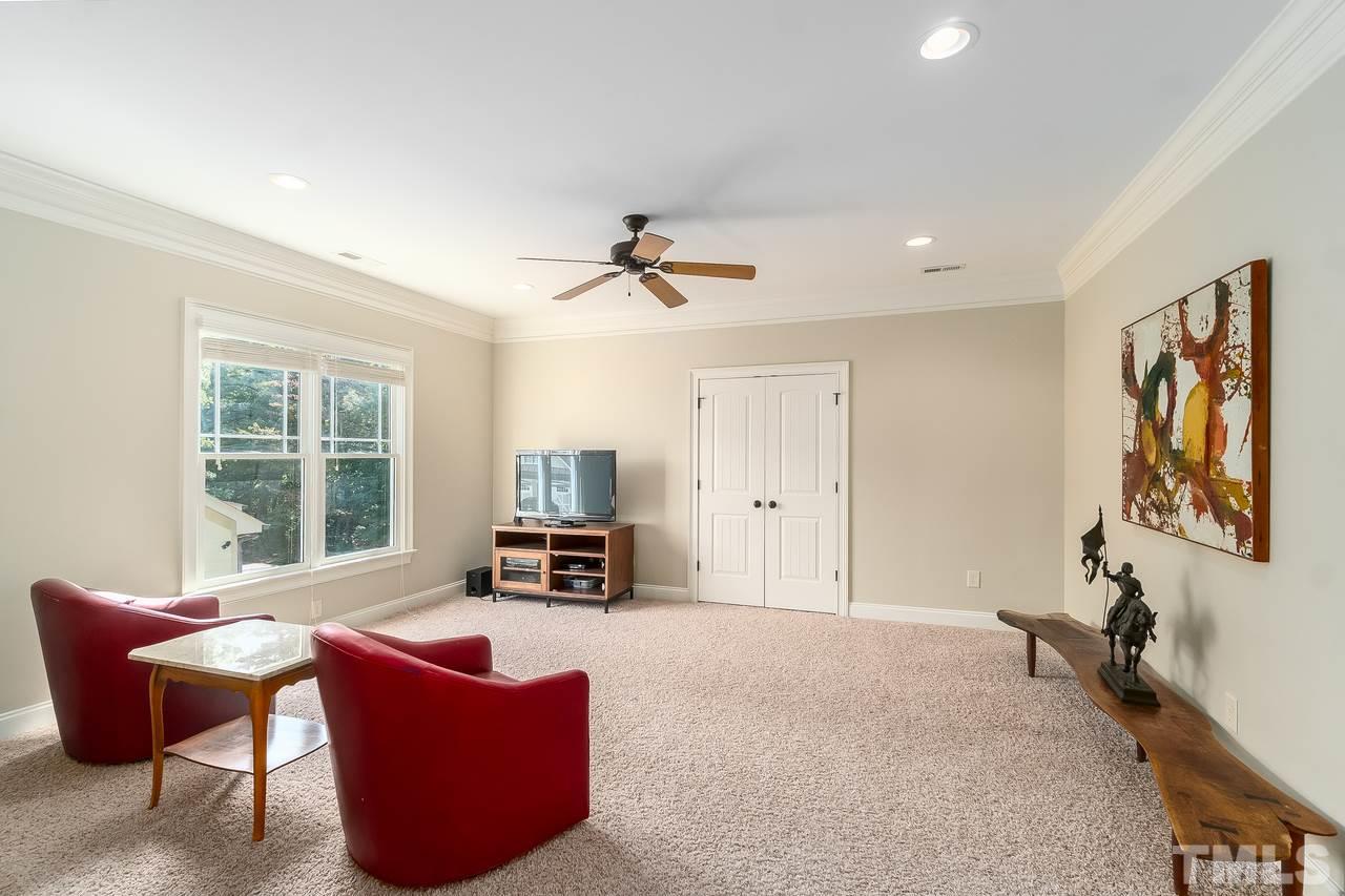 2310 Finley Ridge Lane Raleigh, NC 27615 - Photo 25 of 29 This bonus room is over-sized and ready for anything you want it to be.
