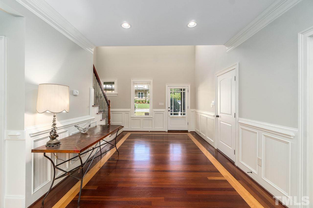 2310 Finley Ridge Lane Raleigh, NC 27615 - Photo 5 of 29 Large entrance with gorgeous Brazilian Cherry hardwood floors.