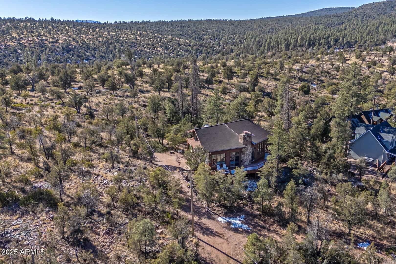 6181 Sharyn Road Pine, AZ 85544 - Photo 36 of 46 a view of a house with a yard