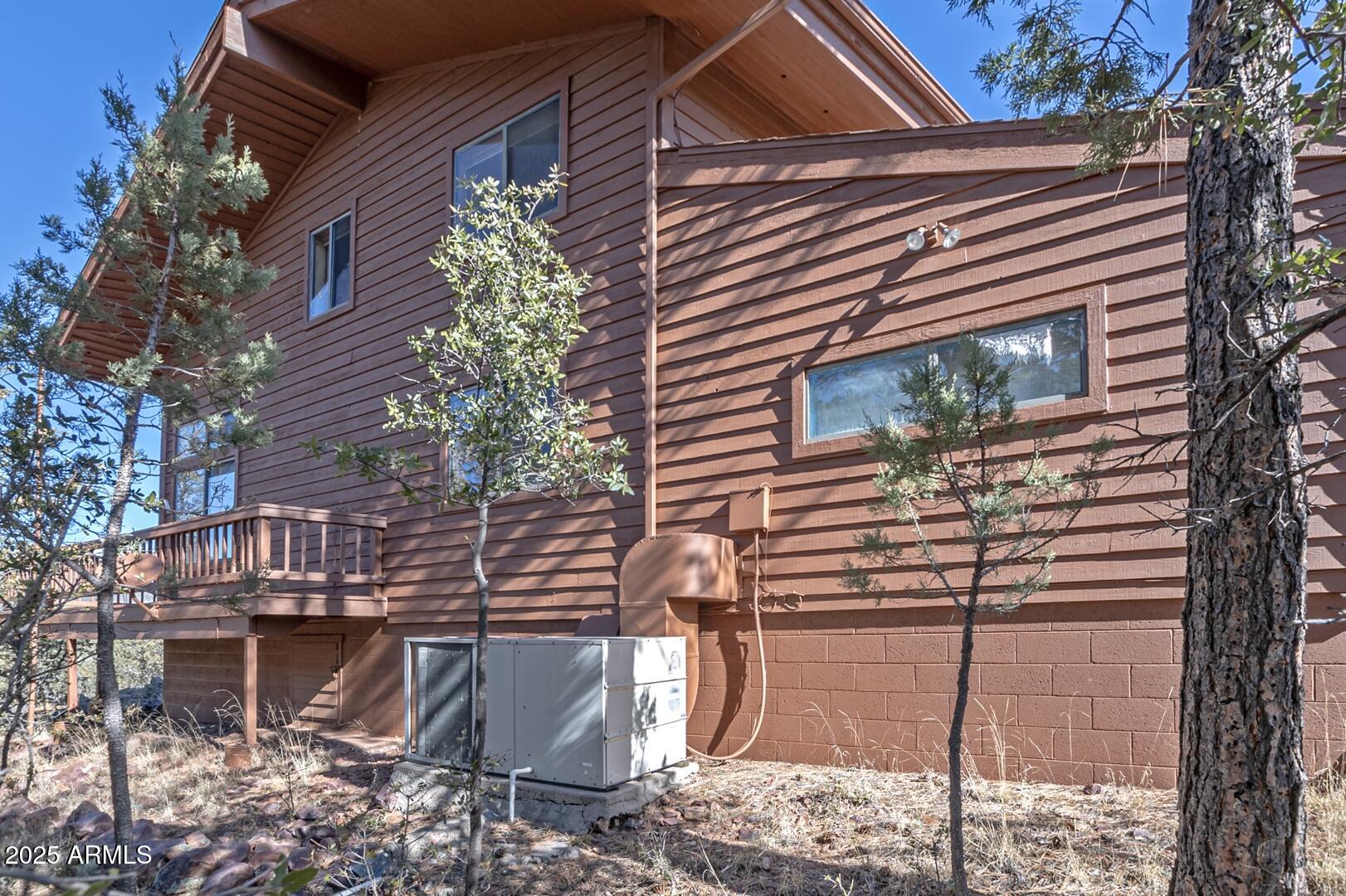 6181 Sharyn Road Pine, AZ 85544 - Photo 43 of 46 a view of a house with a yard