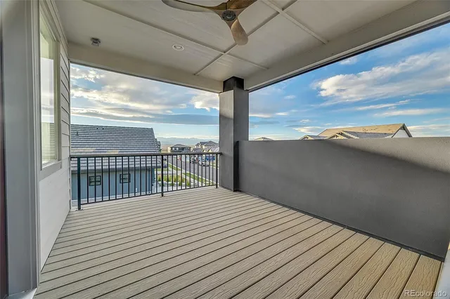 a balcony view with wooden floor