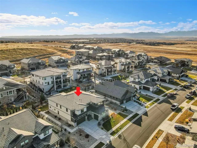 a view of an ocean and a mountain