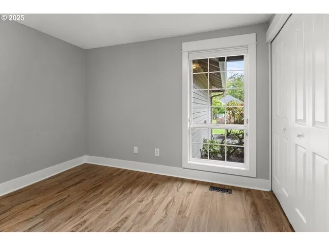 a workspace with furniture and window