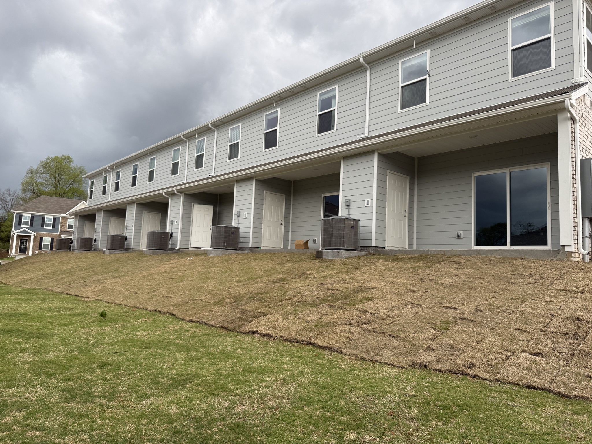 907 Highfield Way Lebanon, TN 37087 - Photo 9 of 10 a front view of a house with a garden