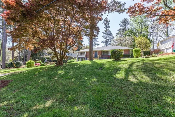 a view of a house with a big yard