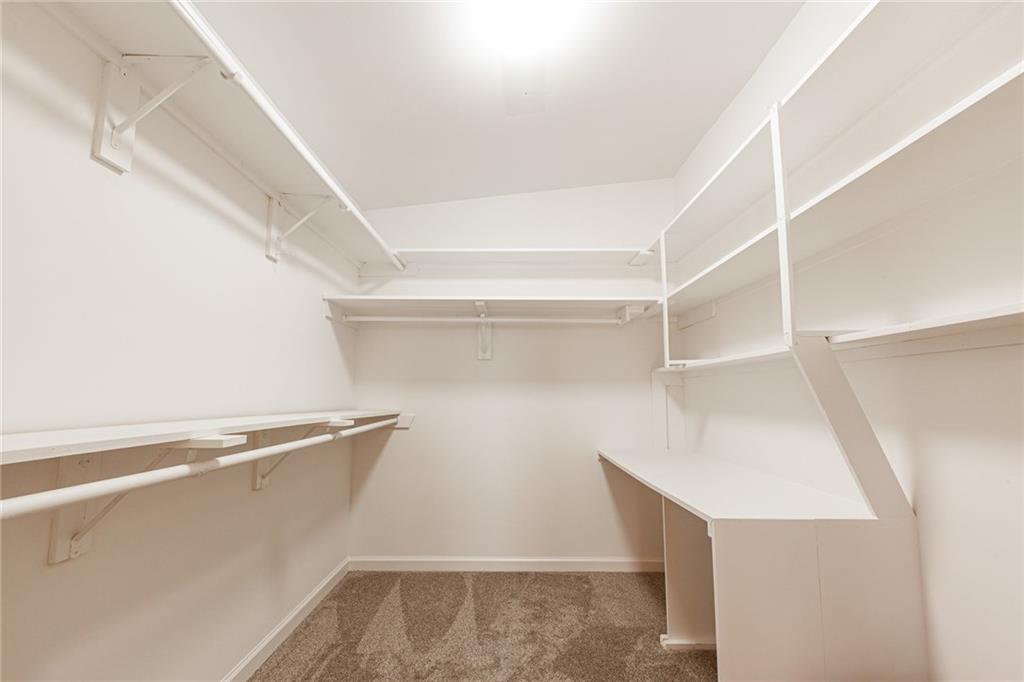 2115 Pinellas Trail Decatur, GA 30033 - Photo 18 of 29 a view of walk in closet with empty racks