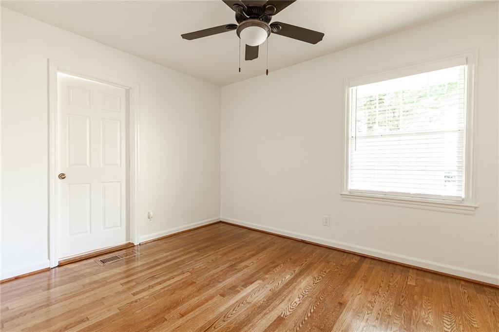 2115 Pinellas Trail Decatur, GA 30033 - Photo 21 of 29 a view of empty room with wooden floor and fan