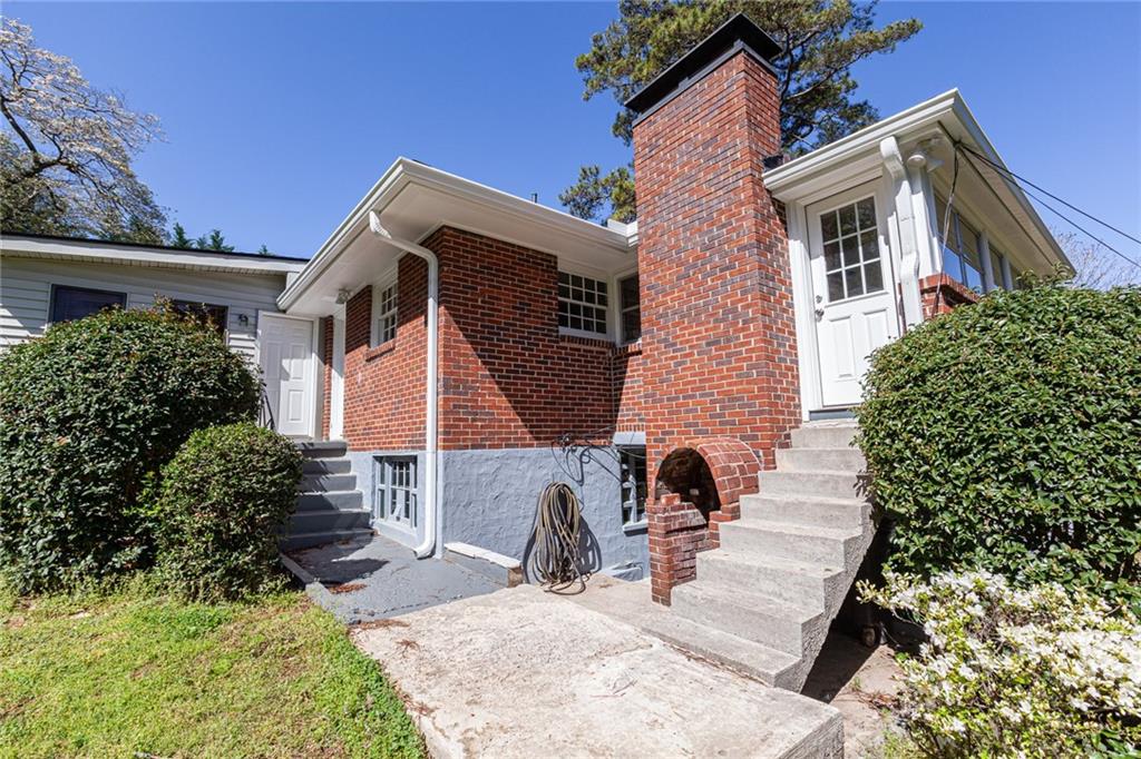 2115 Pinellas Trail Decatur, GA 30033 - Photo 27 of 29 front view of a house with potted plants