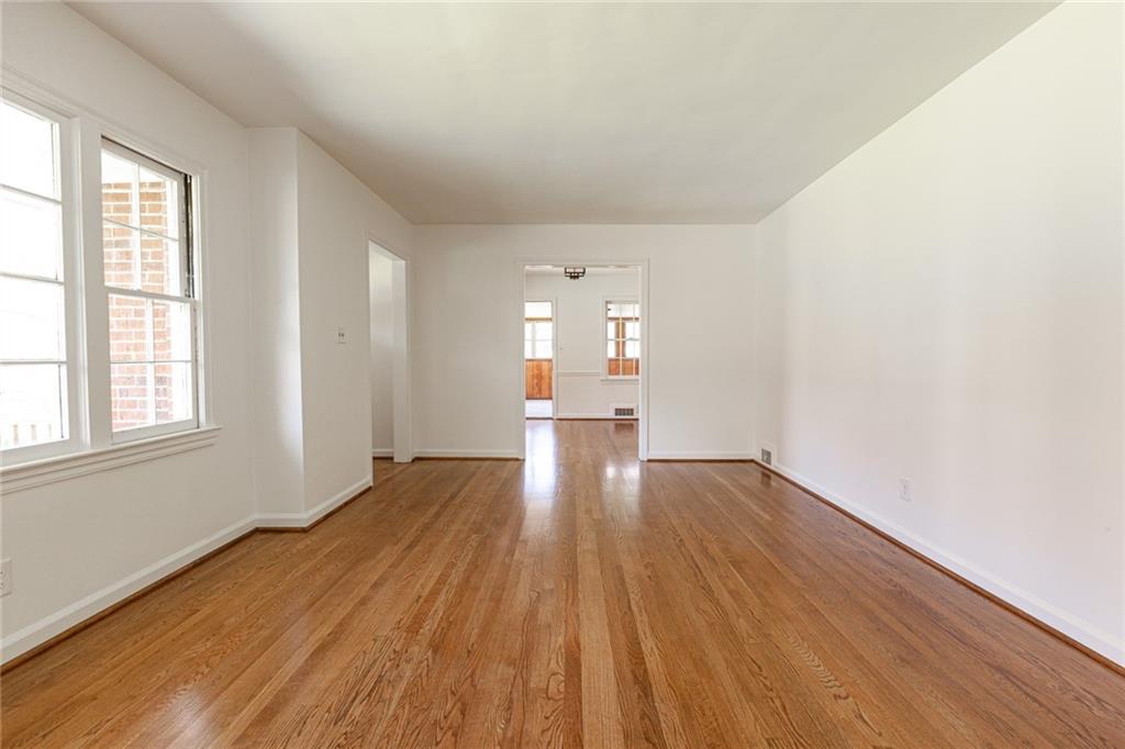 2115 Pinellas Trail Decatur, GA 30033 - Photo 7 of 29 wooden floor in an empty room with a window