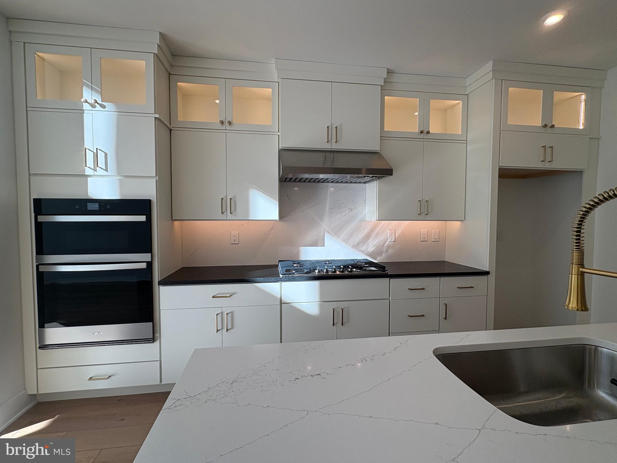 8207 Donatello Drive, Unit 872 Princeton, NJ 08540 - Photo 1 of 27 a kitchen with granite countertop a stove and a sink