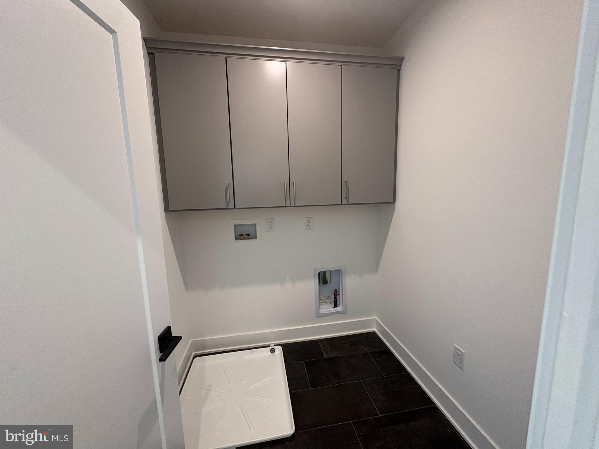 8207 Donatello Drive, Unit 872 Princeton, NJ 08540 - Photo 12 of 27 a view of a storage and utility room with sink