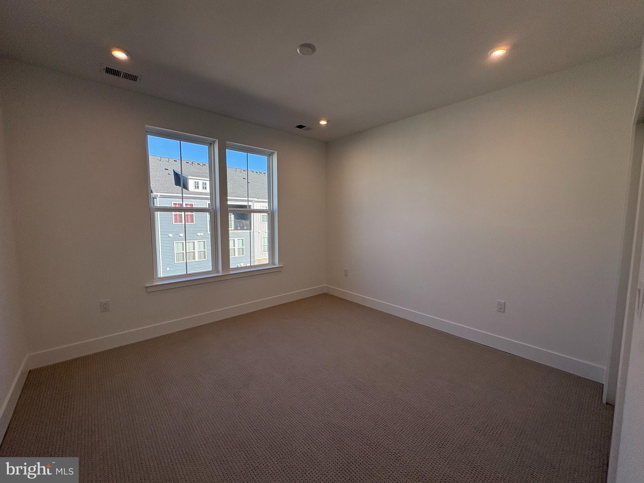 8207 Donatello Drive, Unit 872 Princeton, NJ 08540 - Photo 13 of 27 an empty room with a window