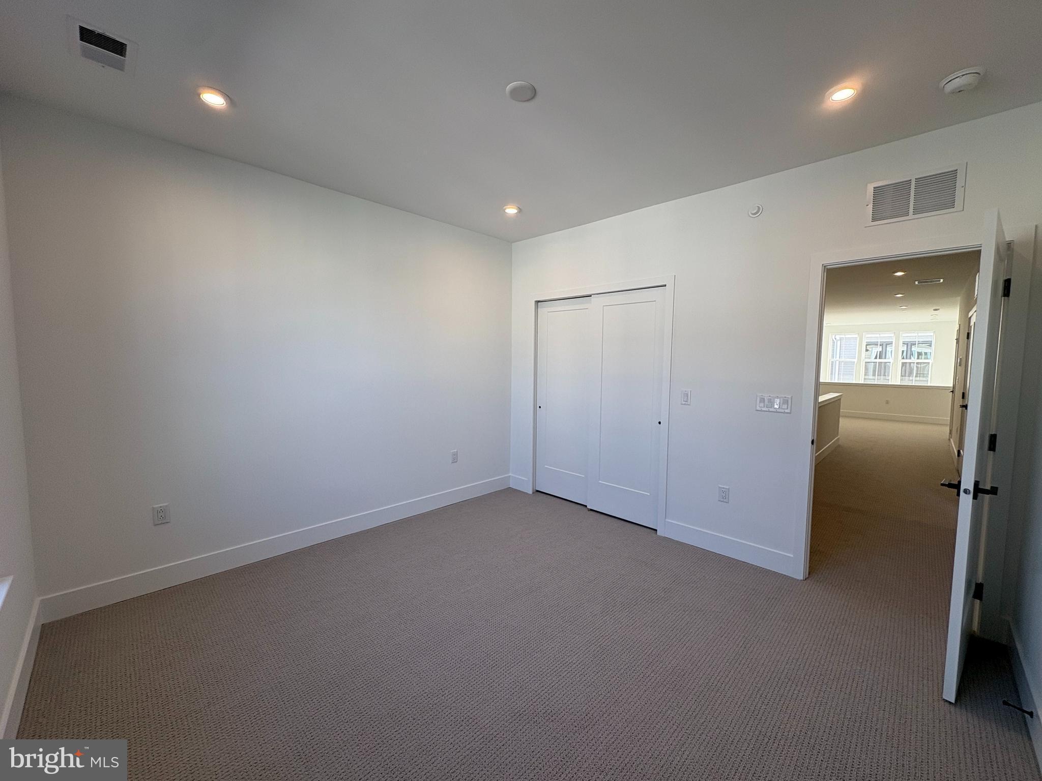 8207 Donatello Drive, Unit 872 Princeton, NJ 08540 - Photo 14 of 27 an empty room with a bathroom