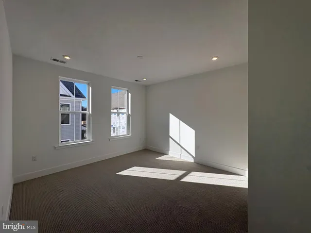 a bathroom with a sink a mirror and a shower