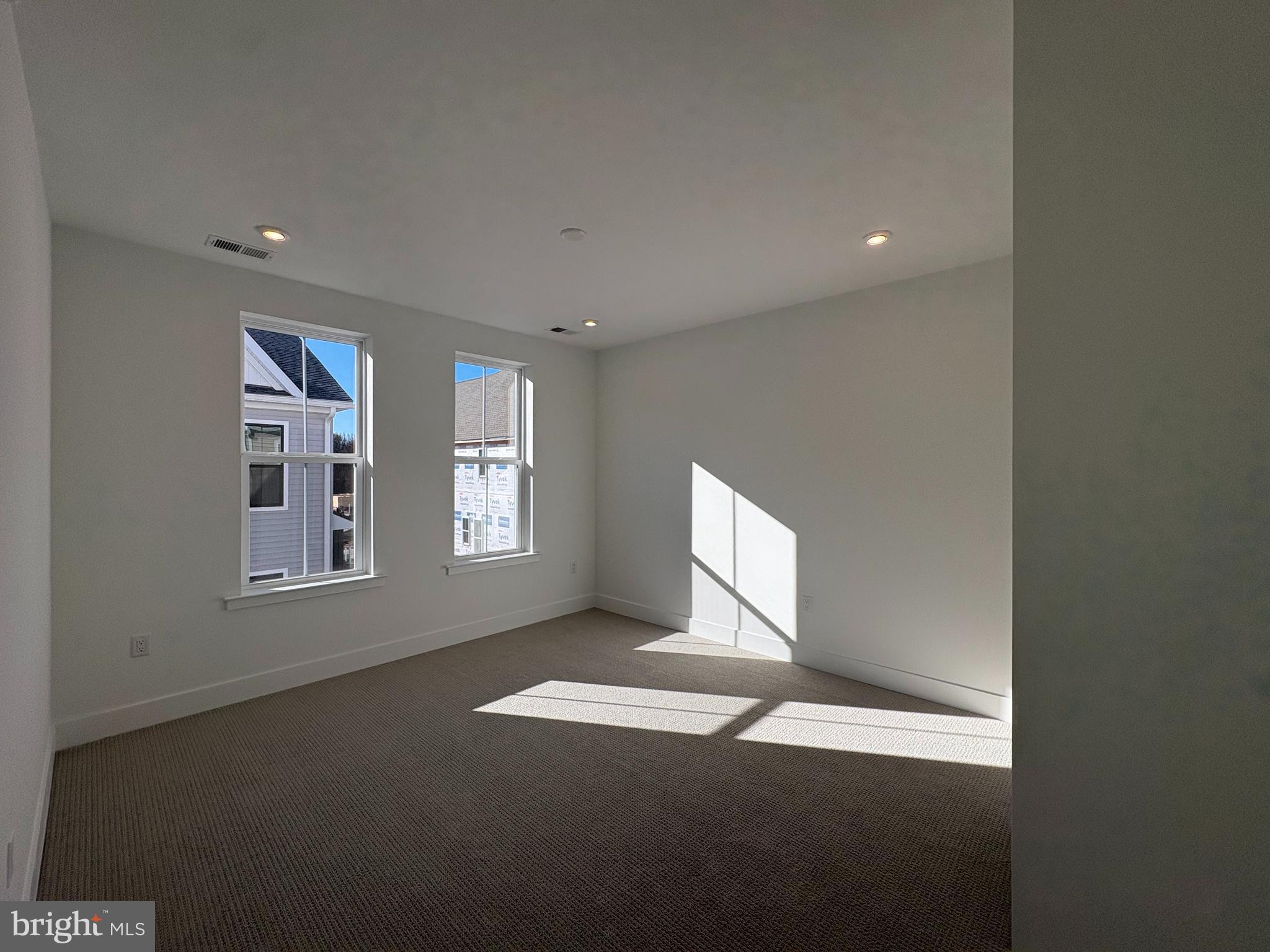 8207 Donatello Drive, Unit 872 Princeton, NJ 08540 - Photo 16 of 27 a view of an empty room with a window