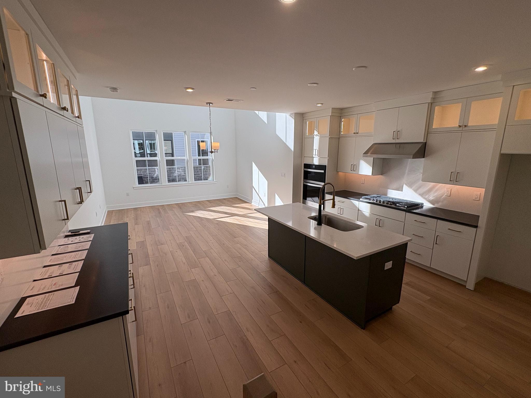 8207 Donatello Drive, Unit 872 Princeton, NJ 08540 - Photo 2 of 27 a living room with granite countertop furniture and wooden floor