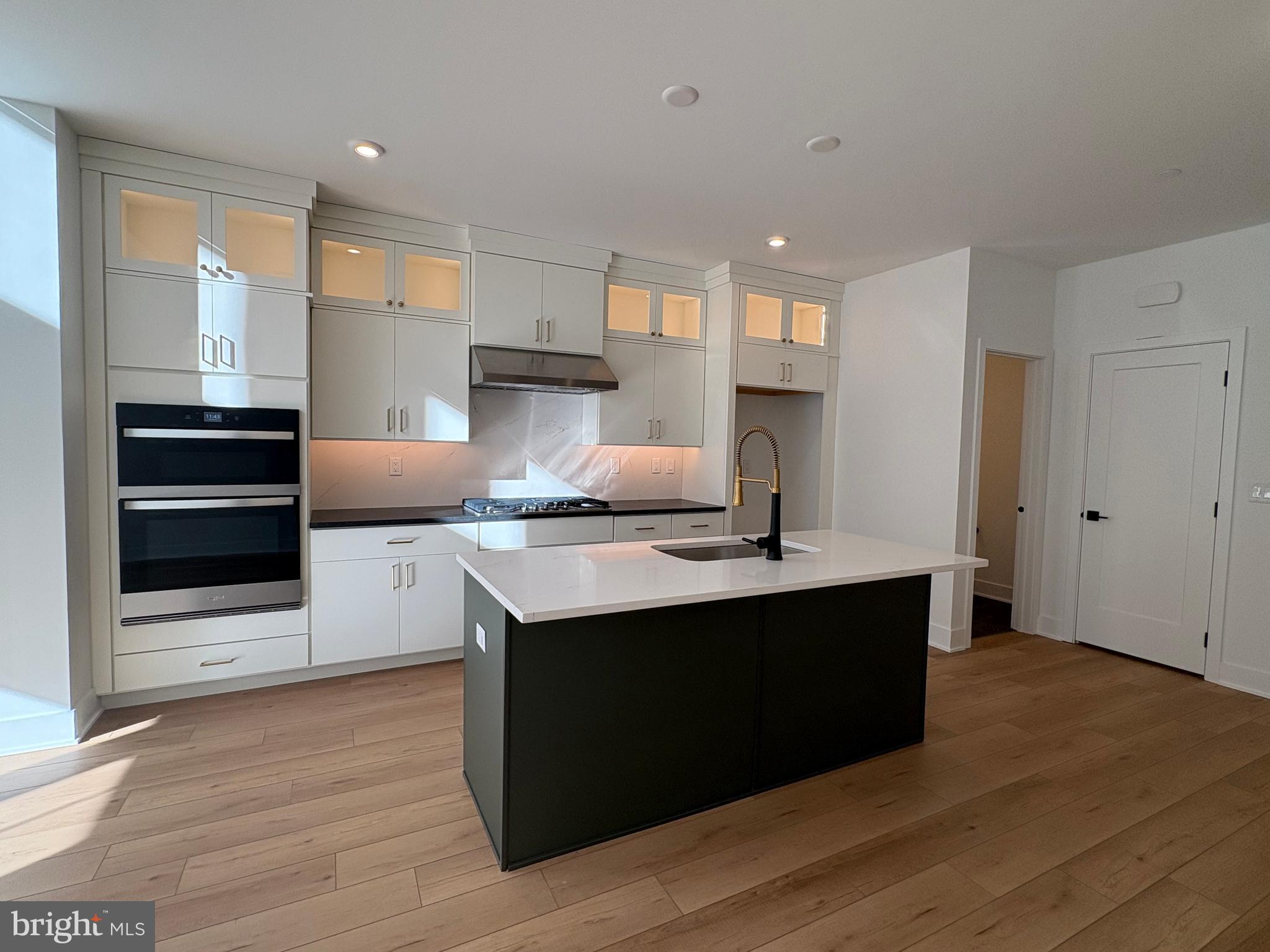 8207 Donatello Drive, Unit 872 Princeton, NJ 08540 - Photo 3 of 27 a kitchen with stainless steel appliances granite countertop a sink stove and refrigerator